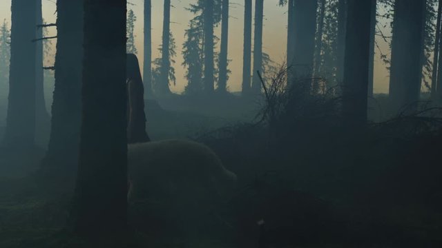 Girl walking in the forest 