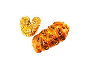 Dough products on white isolated background.Bread with seeds and poppy seeds on white isolated background.