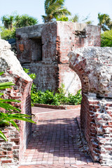 Brick outdoor, outside sidewalk corridor path entrance, arch, archway, antique, old ruins in...