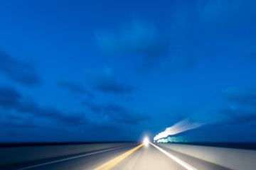 Abstract, conceptual, concept long exposure of moving, driving in car from road, overseas highway...