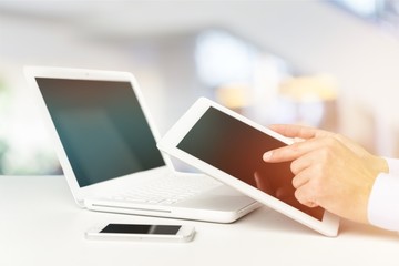 Close-up Doctor at hospital working with laptop