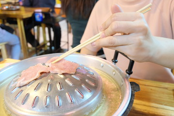 A grill pan, Thai barbecue buffet style.