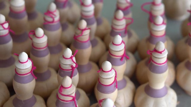 Handmade traditional craft known as 'labu sayong' normally used as gift or souvenir found in Perak,Malaysia. Clay pottery arts. Artistic clay container carving. GRADED.Panning Shot