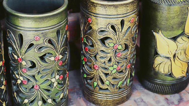 Handmade traditional craft known as 'labu sayong' normally used as gift or souvenir found in Perak,Malaysia. Clay pottery arts. Artistic clay container carving. GRADED.Panning Shot