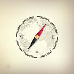 concept of adventure or world travel, graphic of compass on drawing globe 