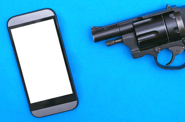 Mobile phone with a blank screen and black handgun on a blue background.