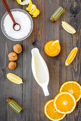 body treatment with citrus cosmetic set wooden desk background top view pattern