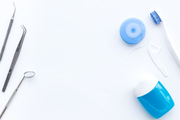 Tooth care with toothbrush, dental floss and dentist instruments. Set of cleaning products for...