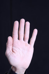 hand isolated on black background