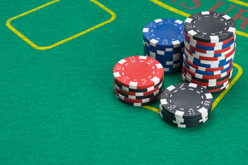 large game bet on the green cloth field, close-up, there is a place for the inscription