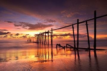 Seascape of Jetty wooden in Pilai beach, Phang-Nga, Thailand. Beautiful of seascape at sunset in sea southern of Thailand, 