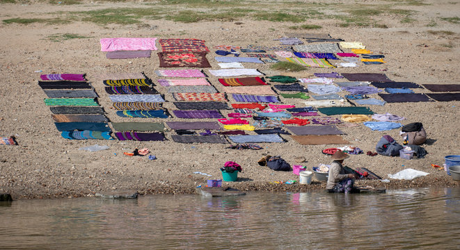 washing on the banks of the Irrawaddy, Myanmar