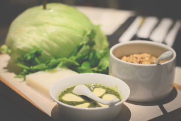DIY noodle salad Noodle sheet,  fresh lettuce leaves, minced chicken sauce, chili sauce
