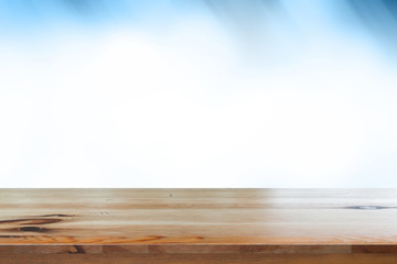 Empty desk with blue gradient blurred bokeh abstract background