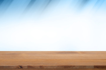 Empty desk with blue gradient blurred bokeh abstract background
