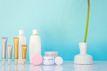 Skincare moisturizer bottle put on white marble desk table
