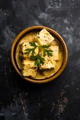 Fototapeta na wymiar Malai or achari Paneer in a gravy made using Whipping Cream. served on a serving pan. selective focus