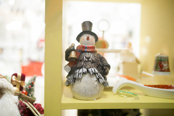 toy snowman with a bell