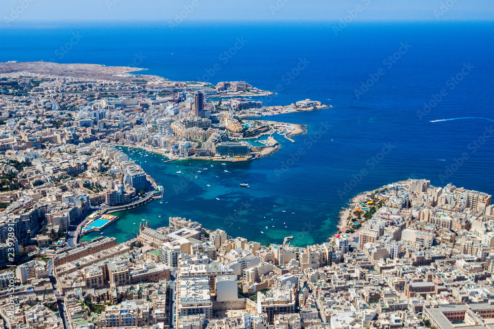 Sticker Malta aerial view. St. Julian's (San Giljan) and Tas-Sliema cities. St. Julian’s bay, Balluta bay, Spinola bay, Towns, harbours and coastline of Malta from above. Skyscraper in Paceville district