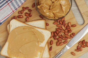 Sandwiches with peanut butter and peanuts