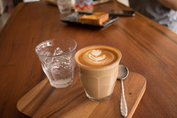 Piccolo Latte art in a cup topping beautiful heart art from milk