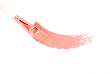 Coral color abstract brush stroke isolated on white. Color of the 2019 year. Stroke made with paint.