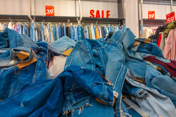 Clothes in a clothing shop during the sale