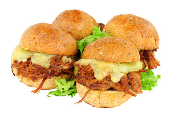 Small shredded beef sandwich sliders with melted cheese isolated on a white background