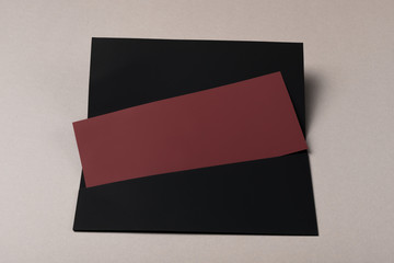 blank envelope and black burgundy letter mockup, isolated on gray