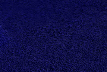 Deep dark blue color luxury genuine cow leather texture background. Close up photography of sofa, chair, interior, auto seat cover