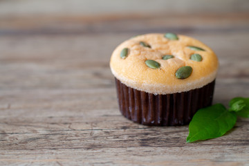 Mamon cake or cupcake on wooden desk background