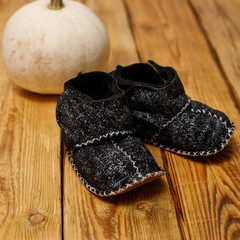 warm shoes on wooden background