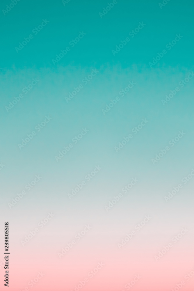 Wall mural surreal predawn clear sky with pink horizon and green atmosphere. smooth pink green gradient of dawn