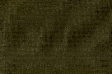 Dark green background from a textile material with wicker pattern, closeup.