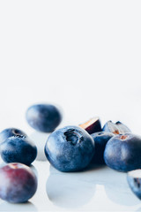 Fresh organic blueberries on a marble background, close up