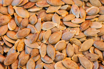 Pumpkin seeds without Husk close up – copy space for text