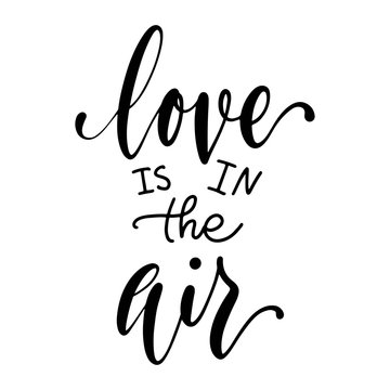 Love is in the air hand lettering isolated on white background. Valentine's day type design. Vector typography illustration.