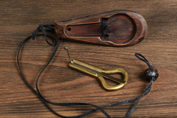 Traditional music instrument komus of Altai and Yakut people . Jaw harp. jew's harp.