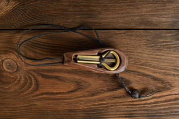 Traditional music instrument komus of Altai and Yakut people . Jaw harp. jew's harp.