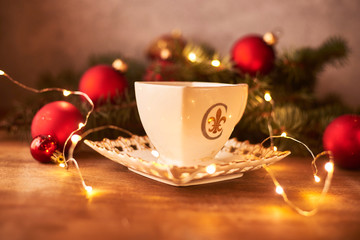 christmas still life with candle and decorations