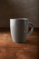 cup of coffee on wooden table