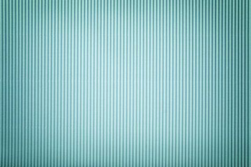 Texture of corrugated light blue paper with vignette, macro.