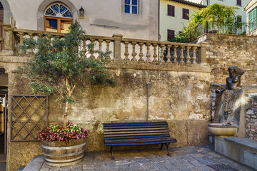 Fototapeta na wymiar On the street in old medieval village Castellina in Chianti. Tuscany. Italy