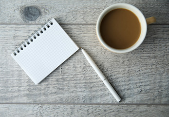 notepad with coffee