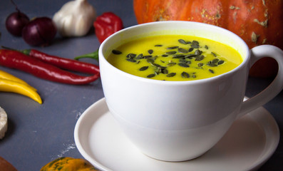 Pumpkin asian coconat cream soup. Autumn hot food