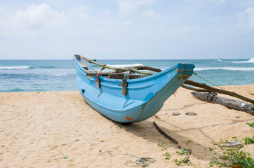 Fototapeta na wymiar The beautiful landscape the boat on the bank of the Indian Ocean