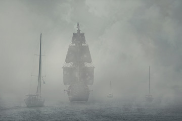 Yachts and a pirate ship in the fog.