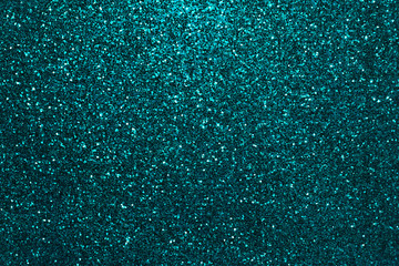 Navy blue sparkling background from small sequins, closeup. Brilliant backdrop.