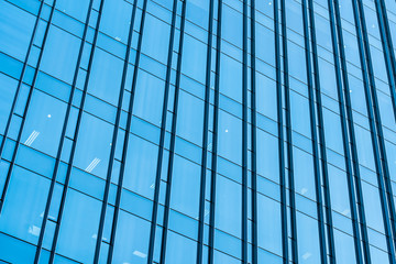 Fototapeta premium Beautiful business office building skyscraper with window glass
