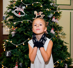 Girl and New Year tree